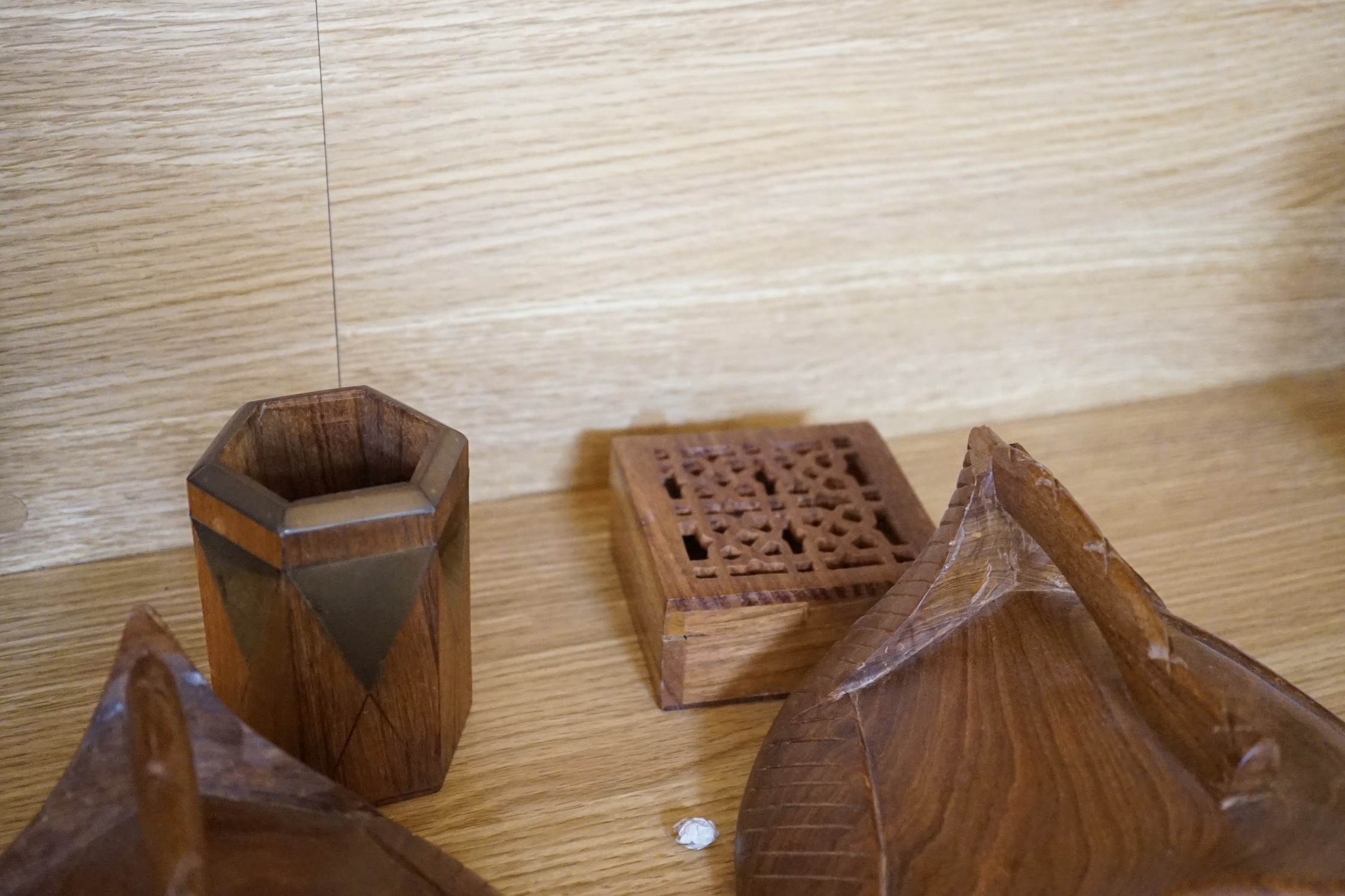 A quantity of African and other carvings including an ostrich egg